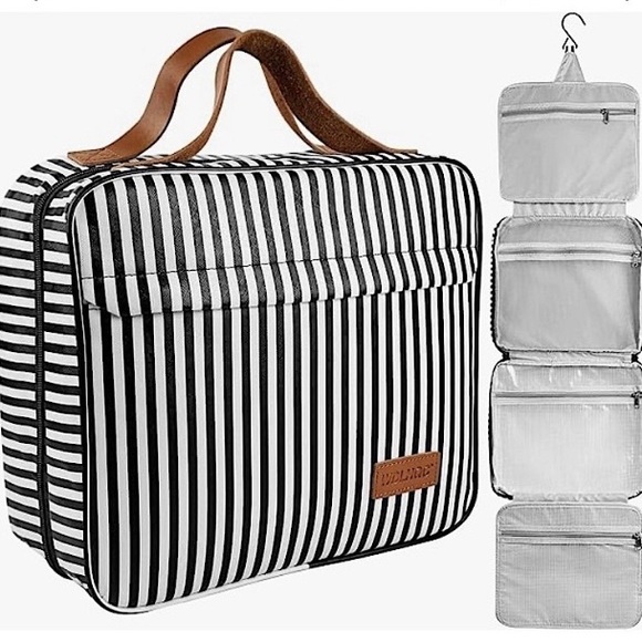 Source Unknown Handbags - Hanging toiletry bag. Brown and white. Four large compartments